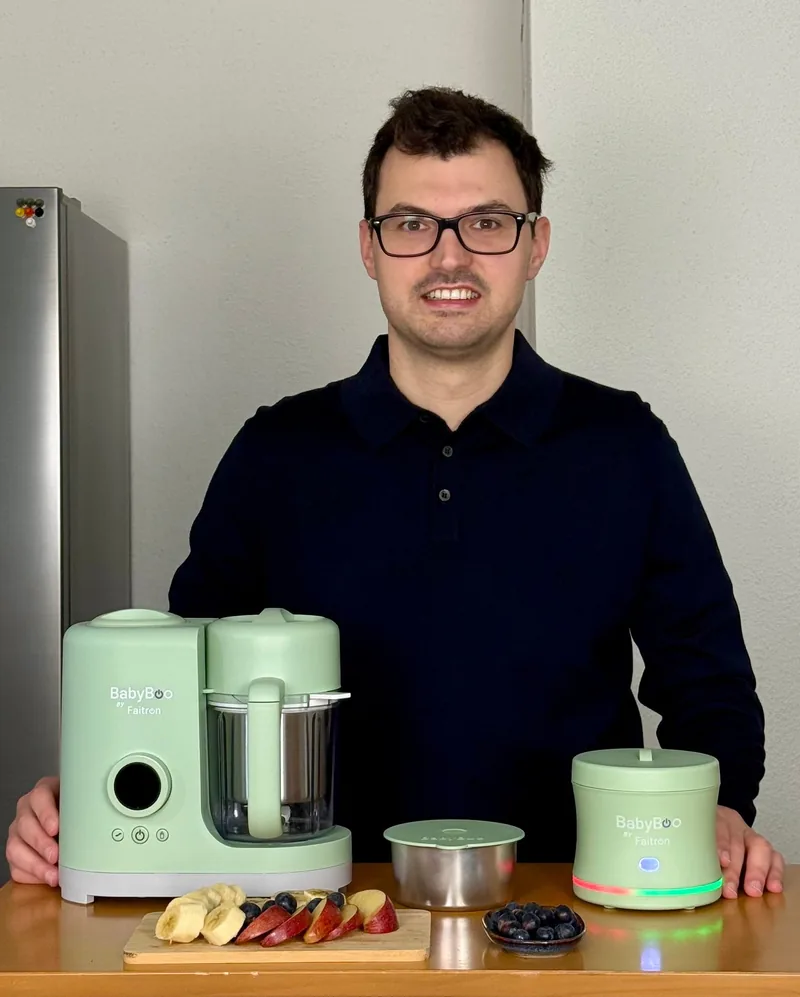 Fabian Graf, BabyBoo's founder and Faitron CEO, in his kitchen with the BabyBoo Food Maker and Food Warmer